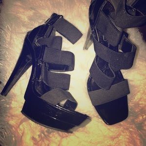 Size 7 Black platform heels.