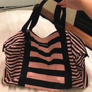 Victoria's Secret black and pink duffle bag