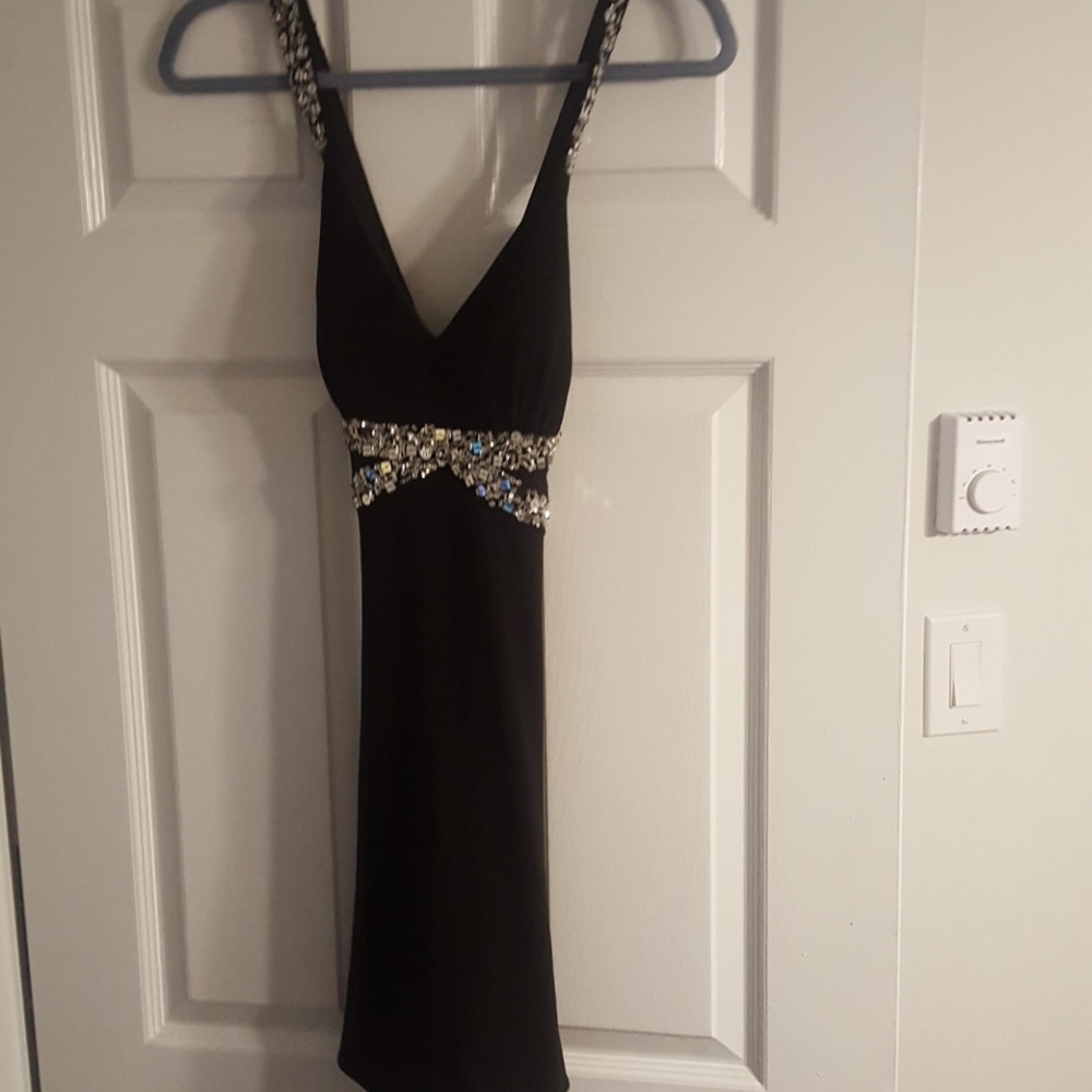 Cross back knee length black dress
