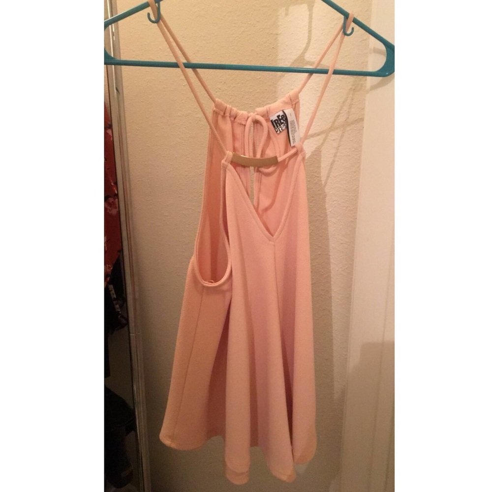 Light pink tank top with gold neck.