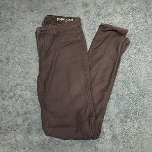 Reversible black/patterned Calvin Klein jeans.