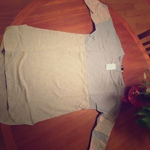 Gray/baby blue mid-length sleeve shirt.