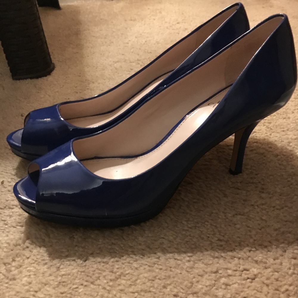 Blue Vince Camuto peep toe pumps
