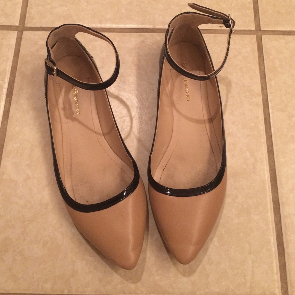 BCBGeneration nude and black flats w/ ankle straps
