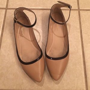 BCBGeneration nude and black flats w/ ankle straps