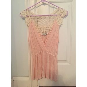 Pink tank top with floral crochet detail