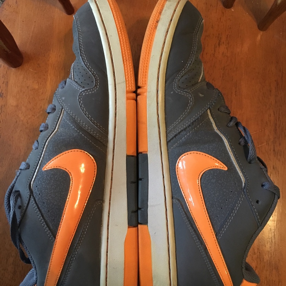 Grey and orange Nike's