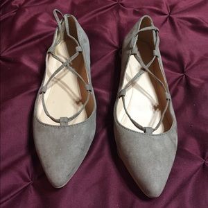 Flat ballerina string ups.