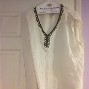 White gauzy top with bronze detail