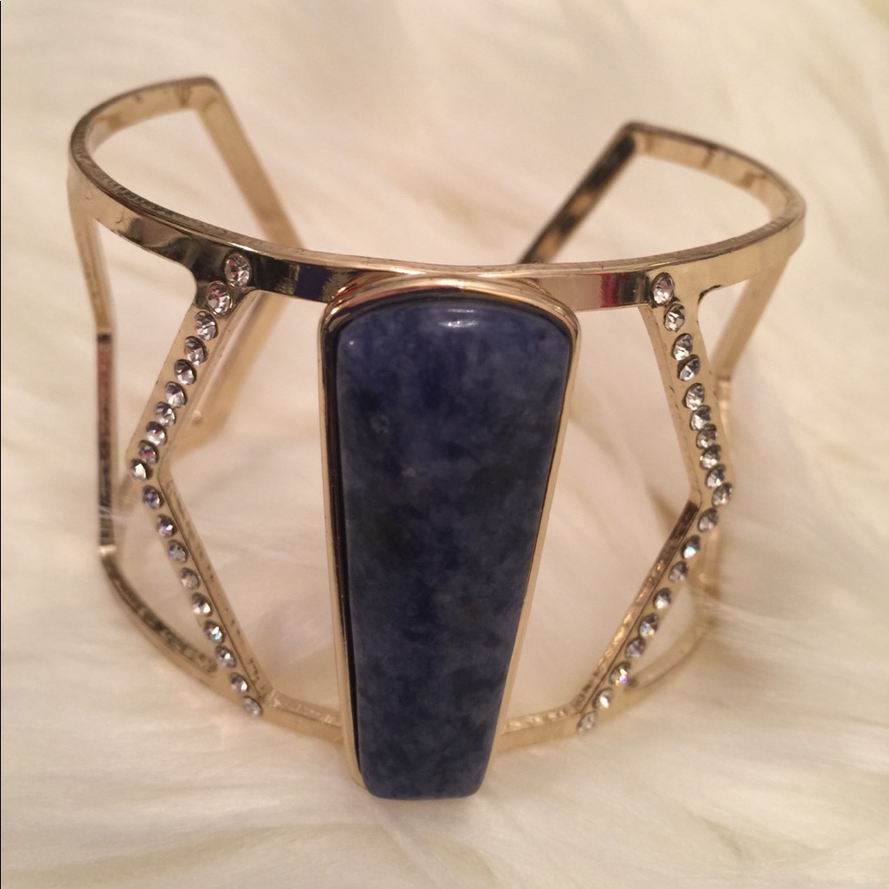 Gold Open Back Bracelet with Center Blue Stone