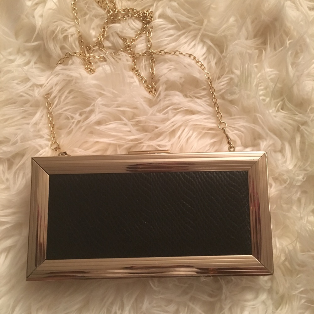 Akira leather black and gold clutch👜👜👛