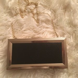 Akira leather black and gold clutch👜👜👛