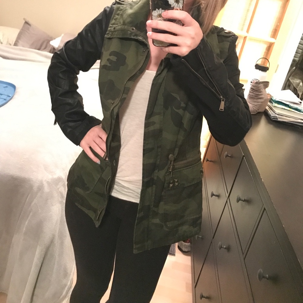 Camo jacket with faux leather sleeves