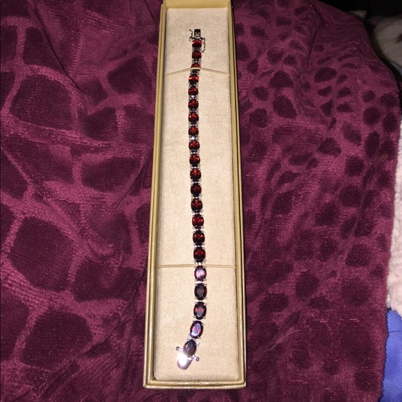 Jewelry - 27.50 Ctw Red Garnet SS tennis bracelet