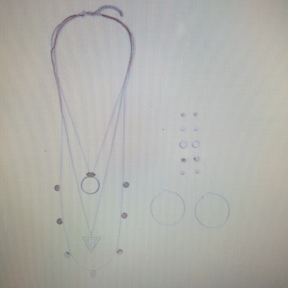 Assorted earrings and layered necklace set