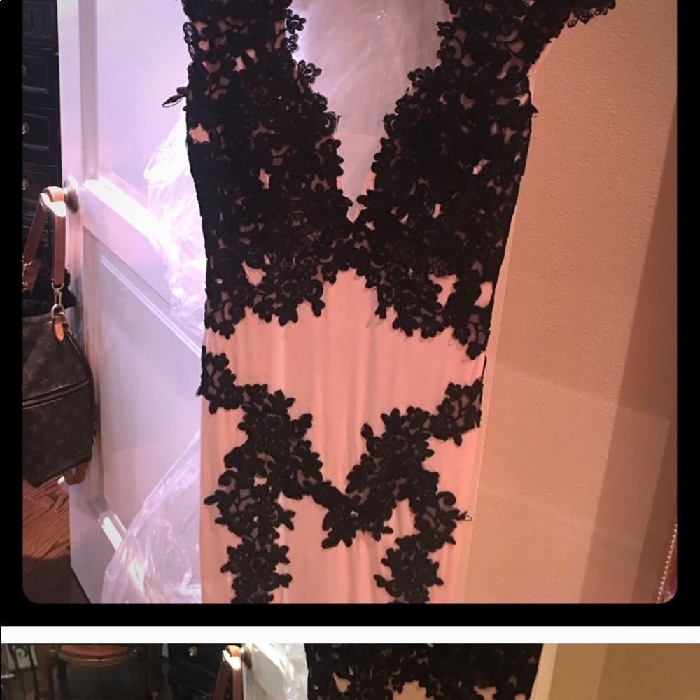 Jovani gently worn ball gown. Nude and black lace