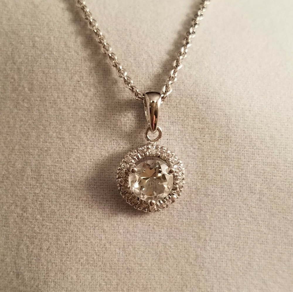 Green Amethyst in a Halo setting