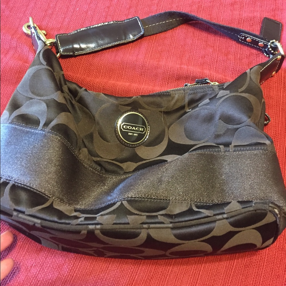 Brown Coach shoulder bag.