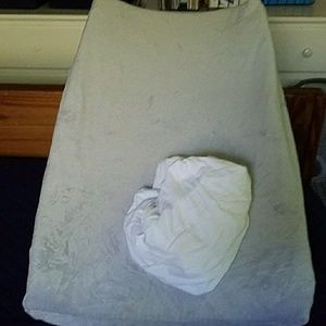 Changing table pad with safety straps