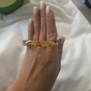 Gold Kate Spade bangle “this is your year”