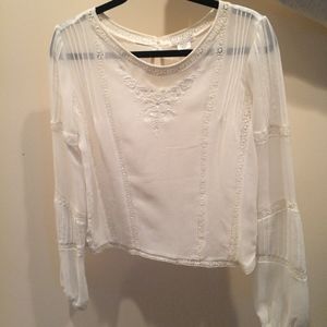 white billabong blouse.