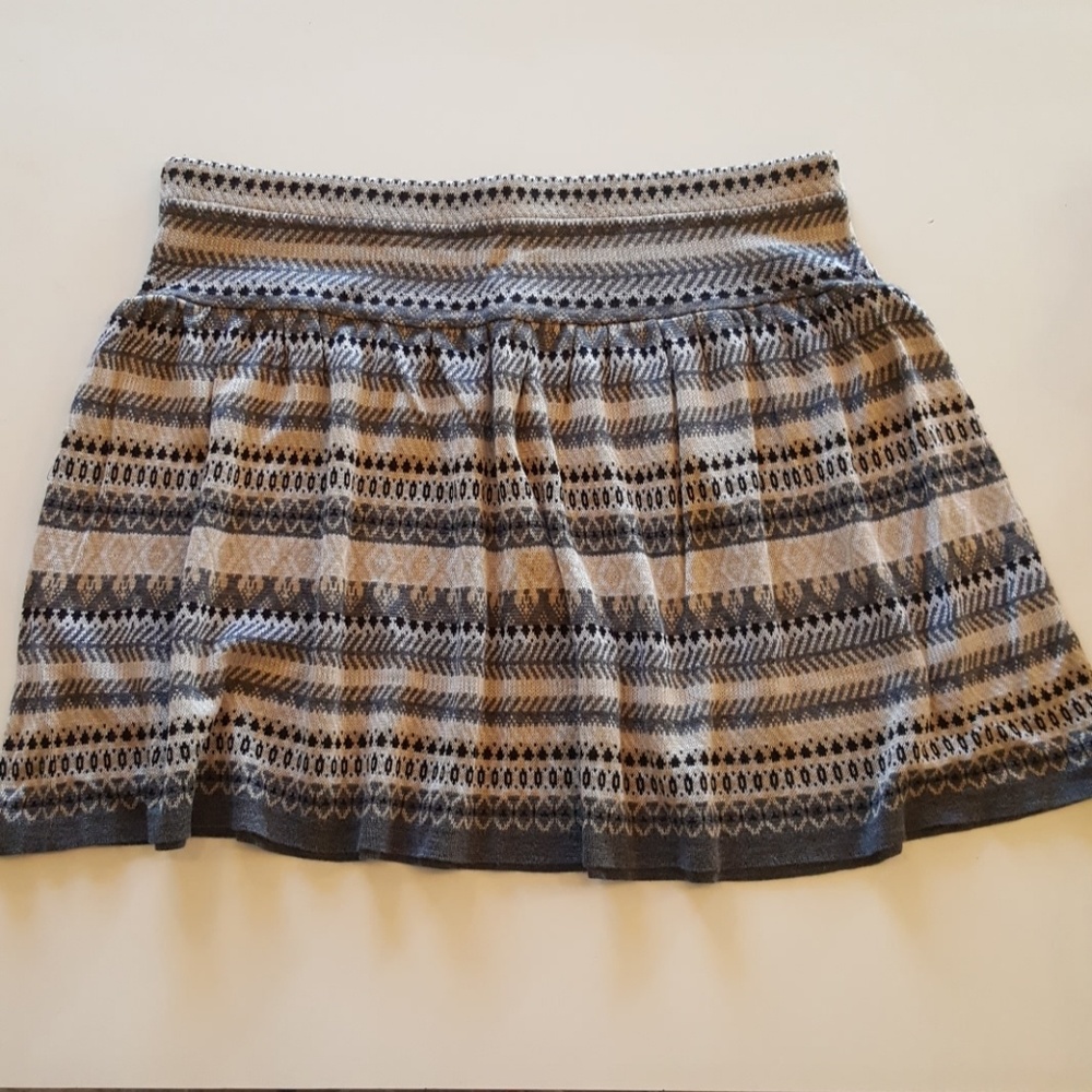 Patterned grey and black skirt.