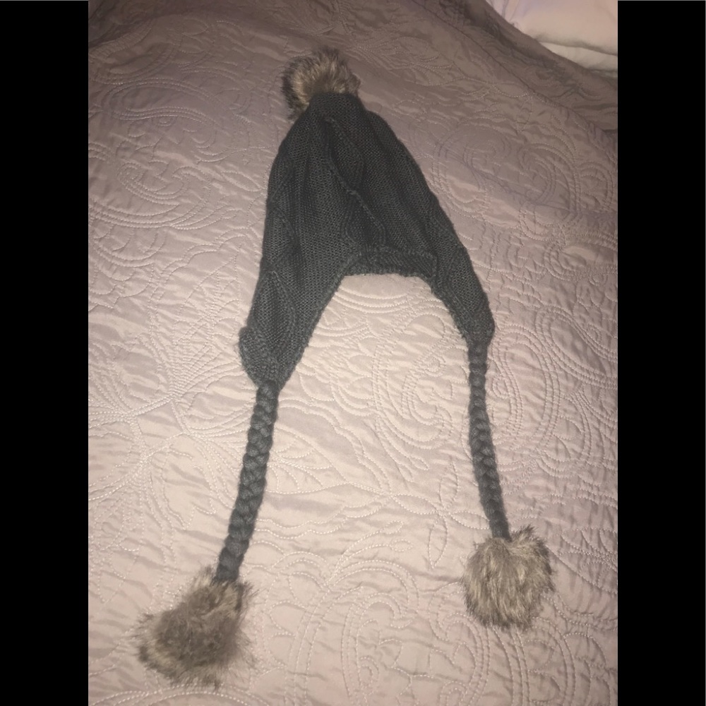 Grey Knit Hat with fur-like Pom-poms.