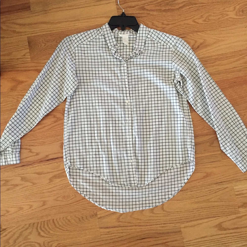 Checkered white and black button down shirt.