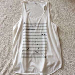Tank with music notes