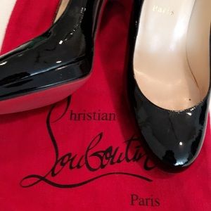 Christian Louboutin black patent leather pumps