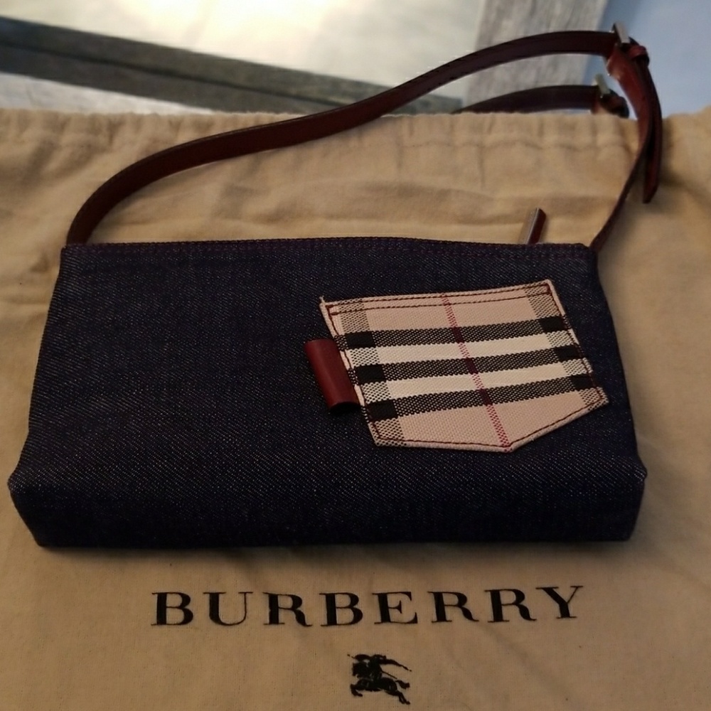 Burberry Clutch Neverr used