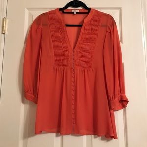 Orange silk blouse