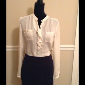Ivory colored blouse size 8.