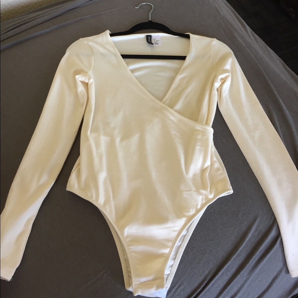 Cream H&M long sleeve bodysuit.