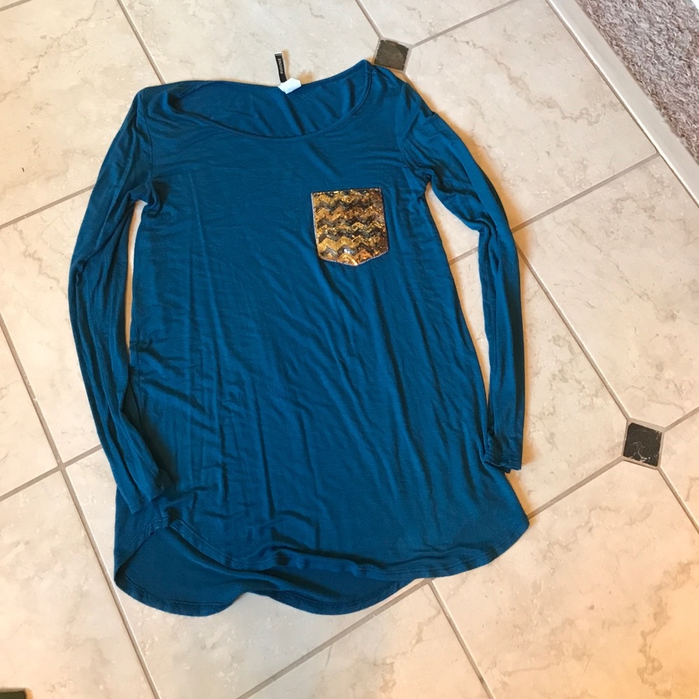 Long sleeved sequin pocket top