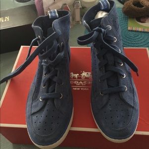 Blue suede high top shoes.