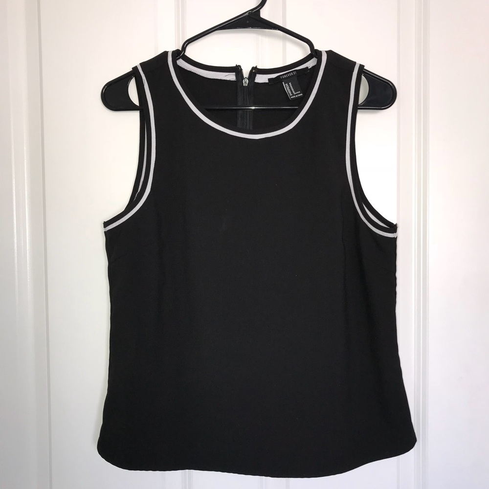 Black blouse with white lining detail
