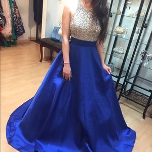 Evening gown.  High neck,silver and blue.