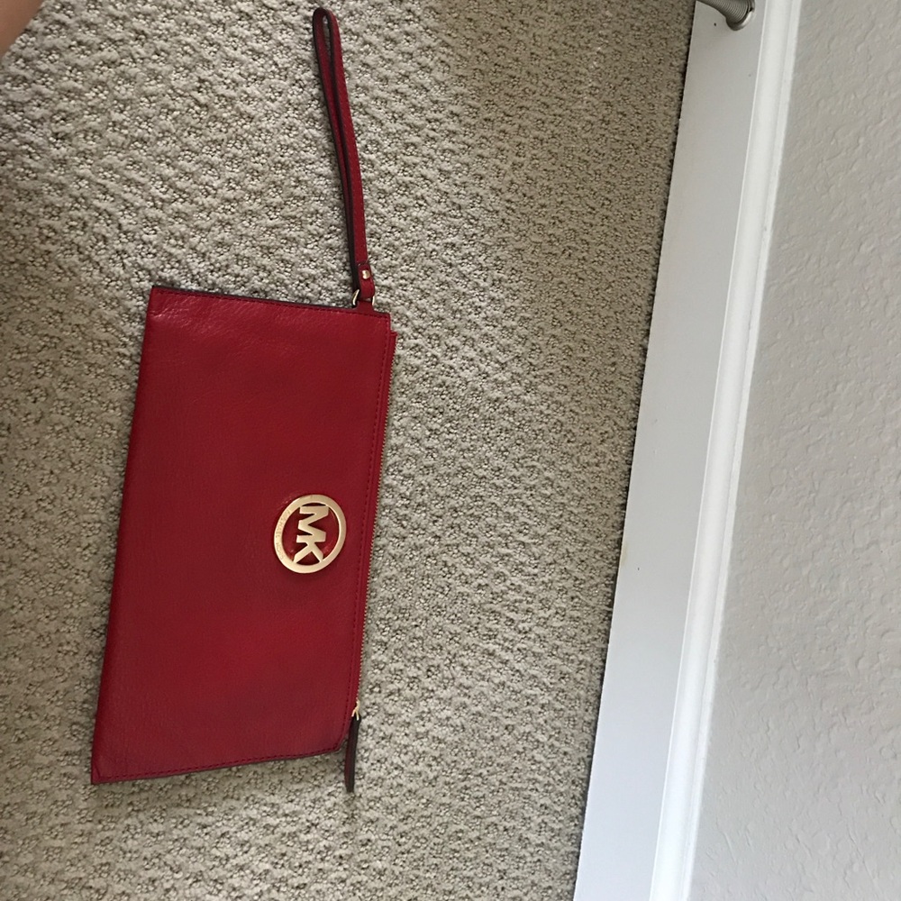 Huge red MK wristlet