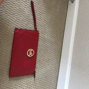 Huge red MK wristlet