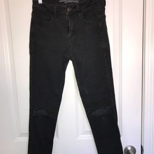 Ripped at the knee black jeans