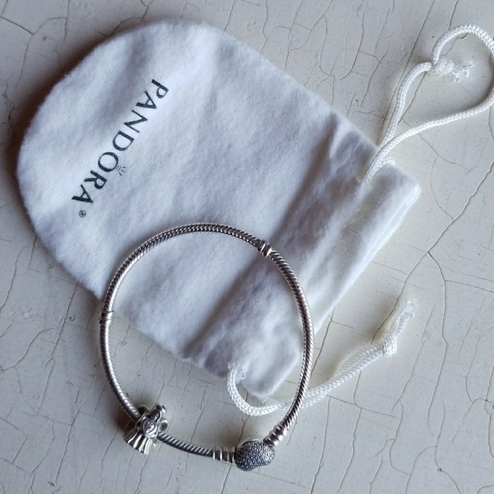 Pandora silver bracelet with heart clasp and charm
