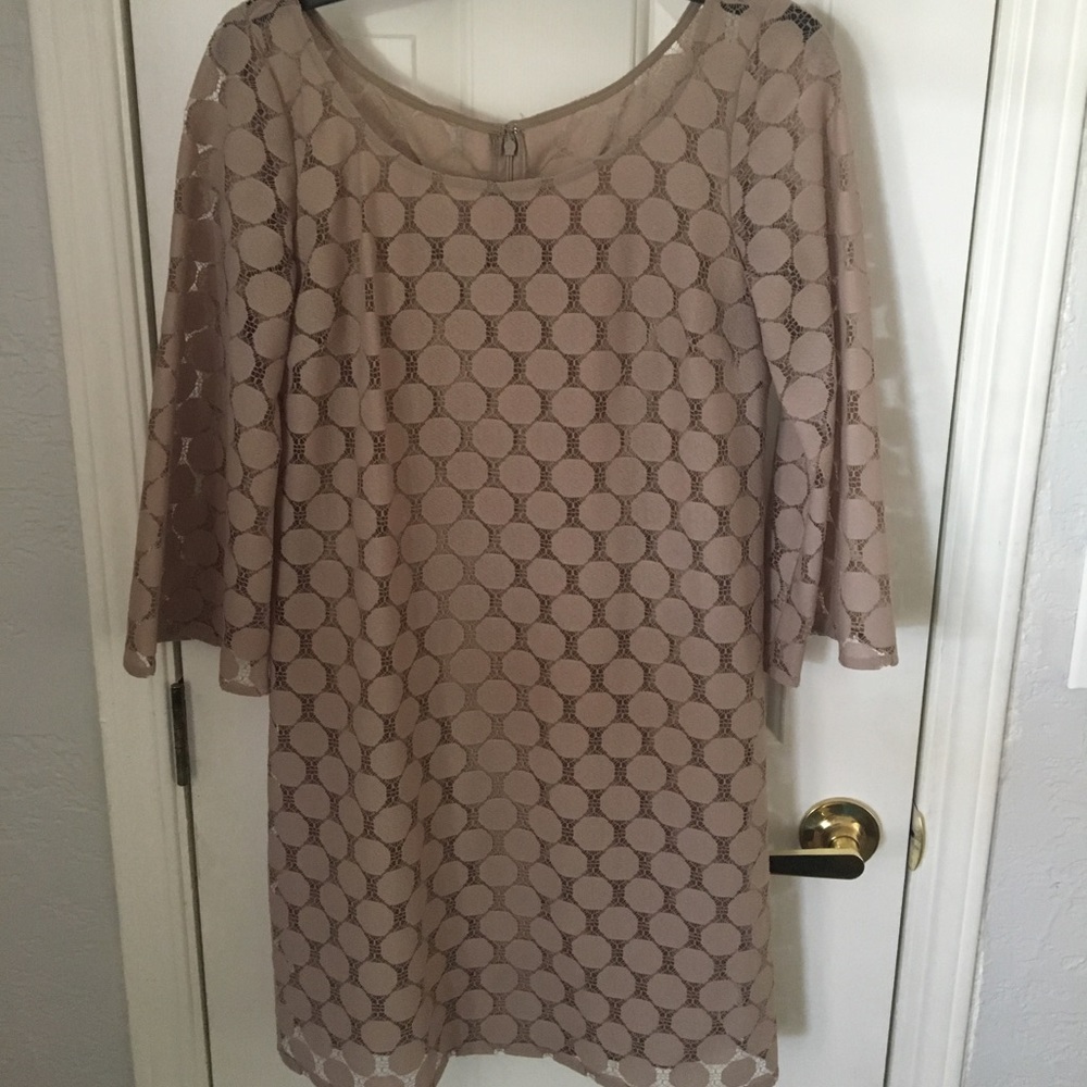 Tan polka dot dress.