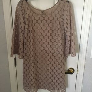 Tan polka dot dress.