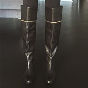 Over the knee flat black boots