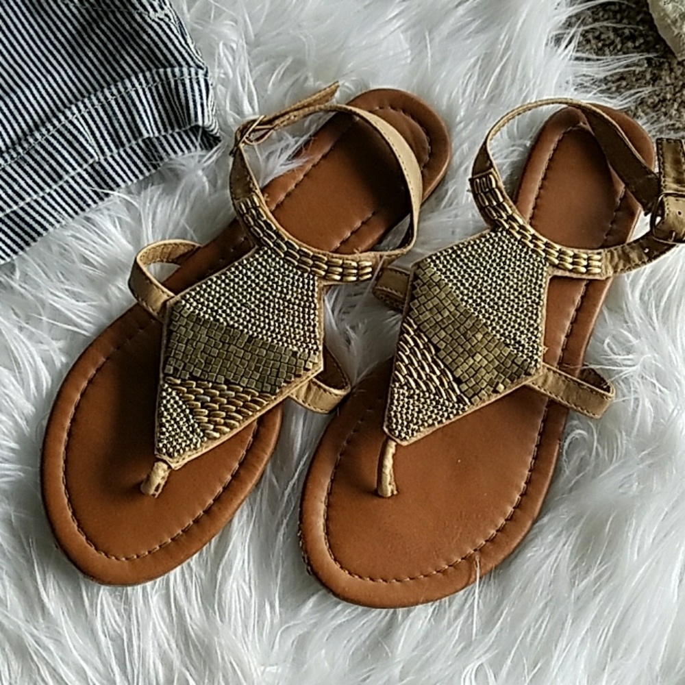 Beaded sandals.