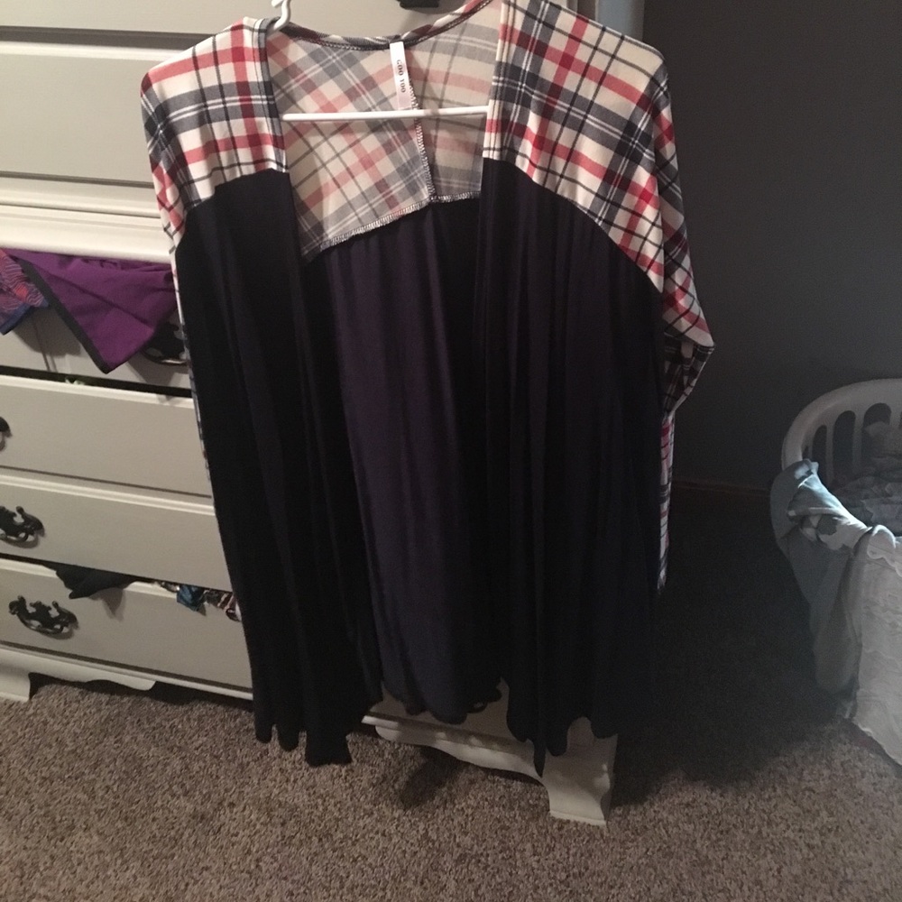 Navy blue cardigan with flannel pattern sleeves