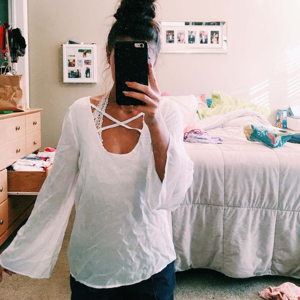 Criss crossed bell sleeve shirt