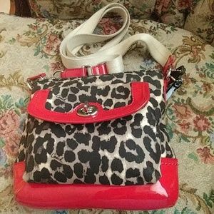 Red and cheetah print crossbody coach purse