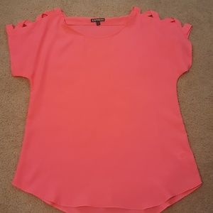 Express top with design cut outs on shoulder